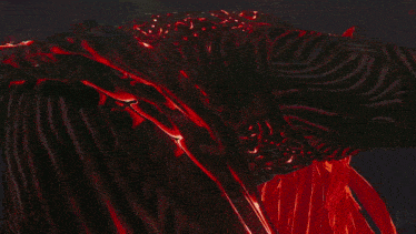 a video game character with red hair and a clock on his chest