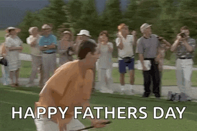 a man is swinging a golf club on a golf course while people watch .