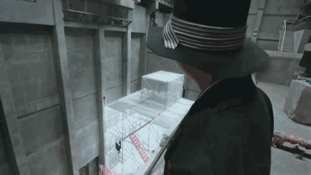 a man in a top hat stands in front of a building with scaffolding on it