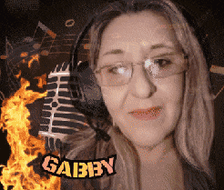 a woman wearing glasses and headphones has the name gabby on her face