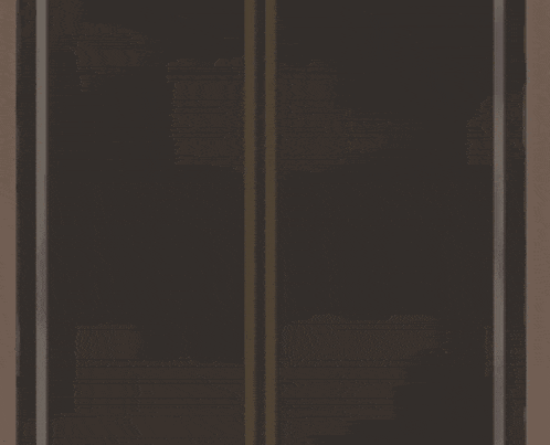 a pixel art drawing of a car with two people in it