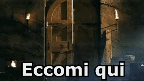 the word eccomi qui is written on a dark background
