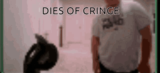 a blurred image of a man with the words dies of cringe written above him