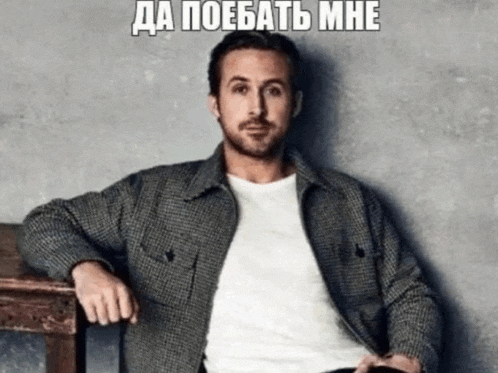 a man in a plaid jacket is sitting on a wooden bench with his hands on his knees and a foreign language caption above him