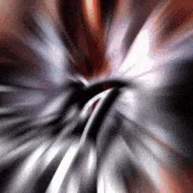 a blurred image of a person 's face with a red and white background