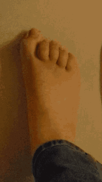 a close up of a person 's foot showing the toes