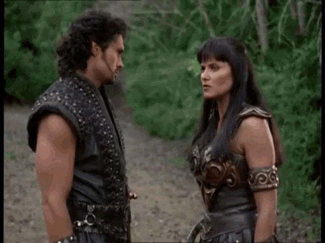 a man and a woman are standing next to each other with either way written on the bottom