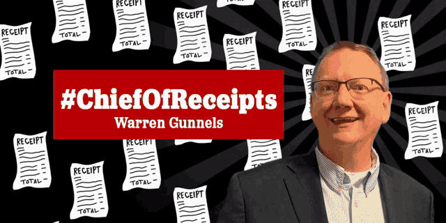 a man in a suit stands in front of a banner that says #chiefofreceipts