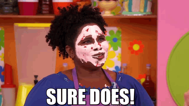 a woman with a white mask on her face says " sure does "