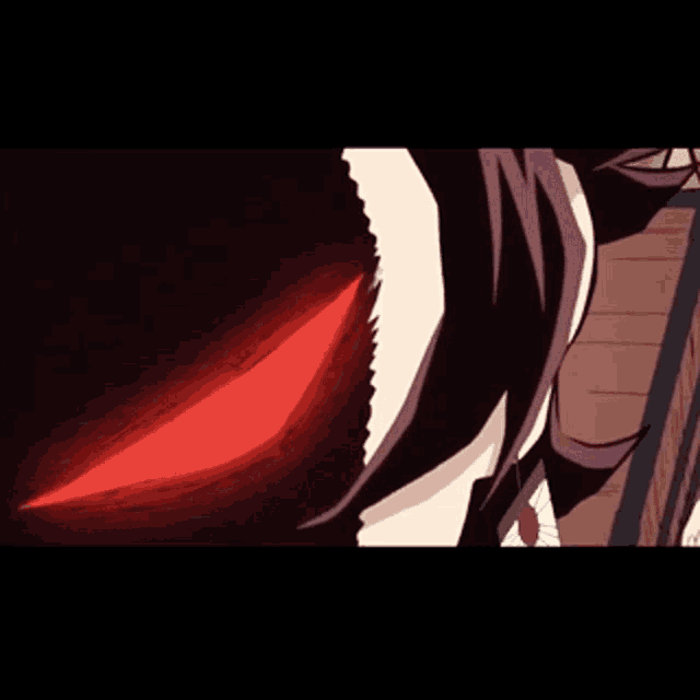 a close up of a person 's face with a red light coming out of their mouth