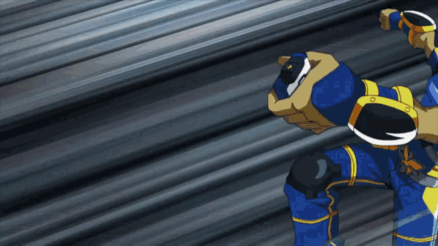 a man in a blue and yellow outfit is holding a remote control