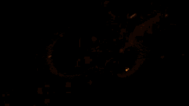 a blurred image of a fire with the word warning visible