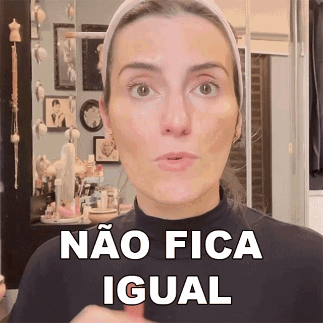 a woman wearing a headband and a black shirt says não fica igual
