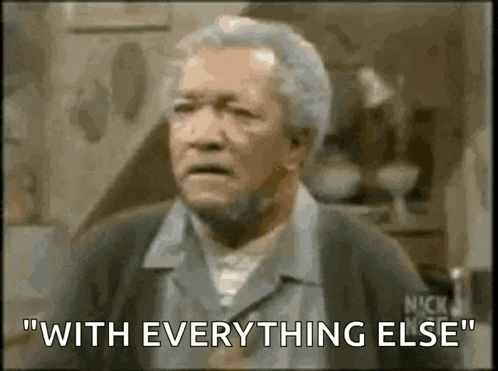 a man with gray hair and a beard says " with everything else " .