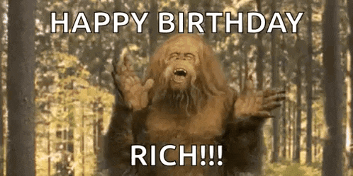 a bigfoot is standing in the middle of a forest with his arms outstretched and says `` happy birthday rich '' .