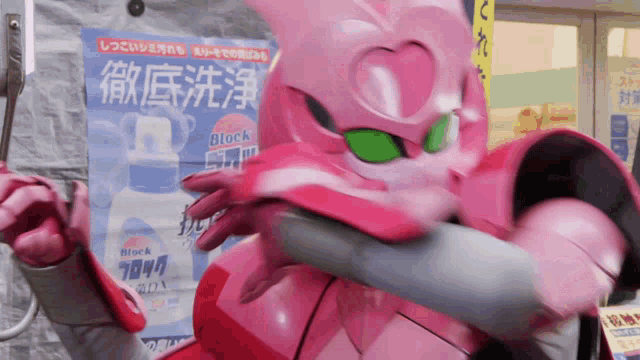 a pink robot is standing in front of a sign that says " block "