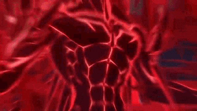 a close up of a red light coming out of a person 's mouth in a dark room .