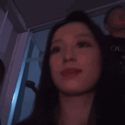a woman with her mouth open and her tongue out