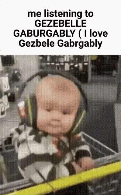 a baby wearing headphones is sitting in a shopping cart ..