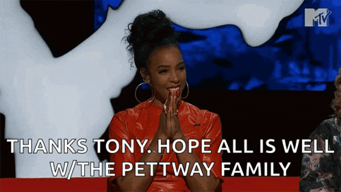 a woman in a red dress says thanks tony hope all is well w/the pettway family