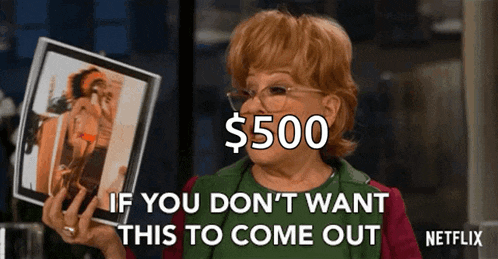 a woman is holding a picture and saying if you don 't want this to come out .