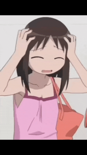 a girl in a pink dress is holding her head with both hands
