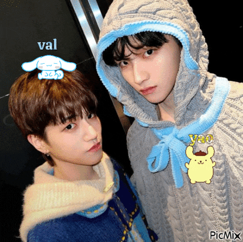 two boys wearing sweaters one with a hoodie and the other with a sweater that says yao