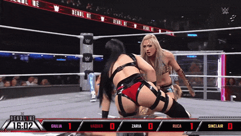 two women wrestling in a ring with deadline written on the bottom of the screen