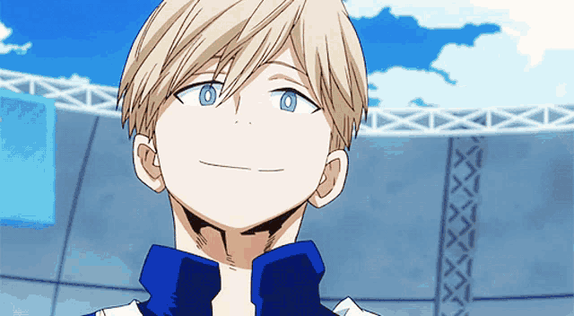 a boy with blonde hair and blue eyes is wearing a blue and white jacket