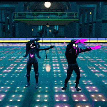 a man and a woman are dancing in a dark room