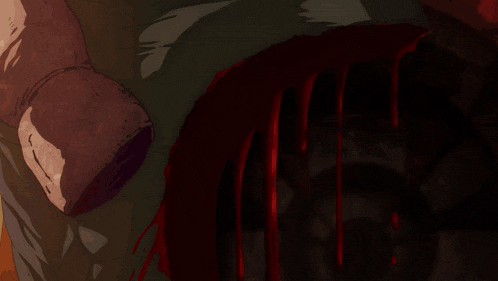 a close up of a person 's hand reaching out towards a bloody object
