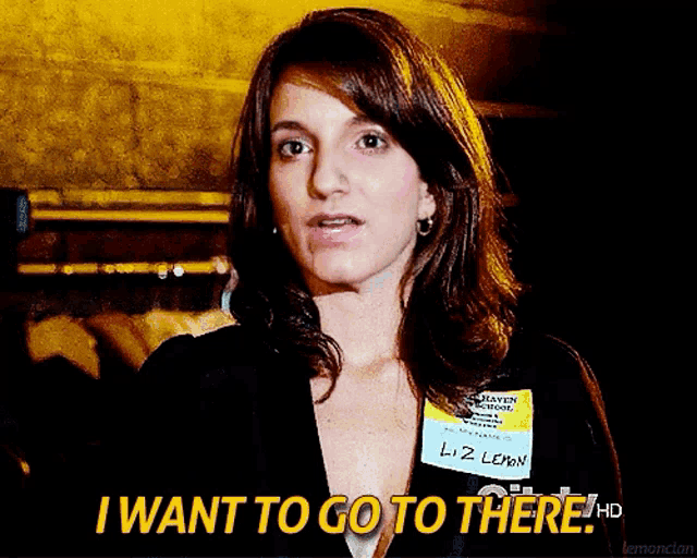 a woman with a name tag that says liz lown