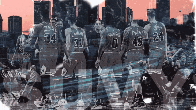a group of basketball players are standing on a court and one of them has the number 0 on his back
