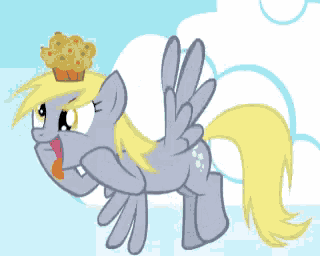 a pony with wings is laying down with a muffin on her head