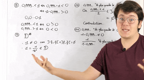 a man is standing in front of a white board with numbers on it including 8 and 10