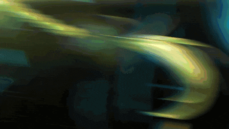 a computer generated image of a yellow and blue swirl in the dark