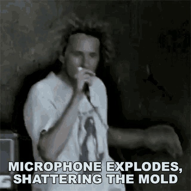 Microphone Explodes Shattering The Mold Tom Morello GIF - Microphone Explodes Shattering The Mold Tom Morello Rage Against The Machine GIFs