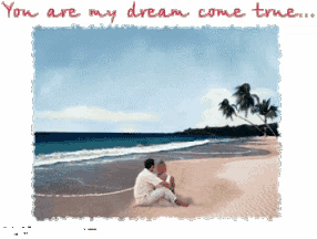 a picture of a man and woman sitting on the beach with the words " you are my dream come true "