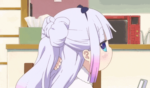 a girl with purple and white hair is standing in front of a red microwave