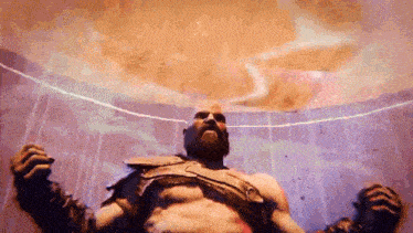 a bald man with a beard is standing in a room with his arms outstretched .