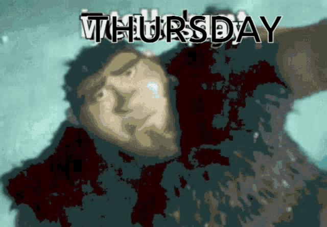 a blurry picture of a man with the word thursday written above him