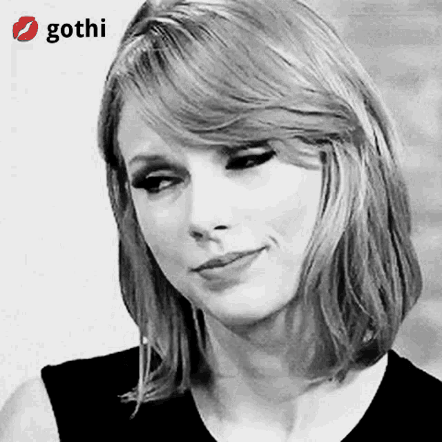 a woman 's face is shown in a black and white photo with a gothi logo in the corner