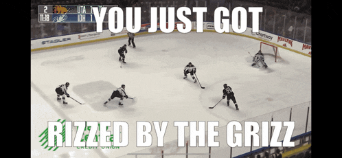 a hockey game is being played with the words you just got rizzled by the grizzly on the bottom