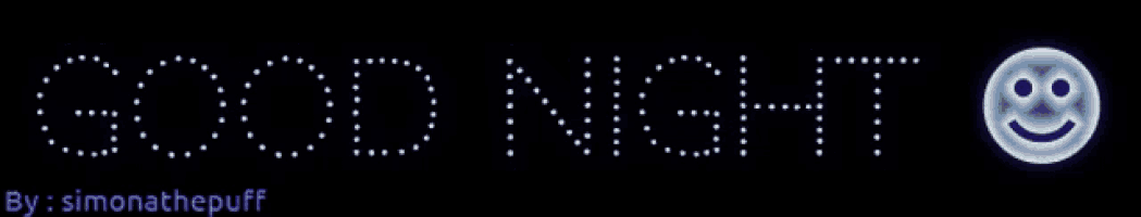 a neon sign that says good night with a smiley face