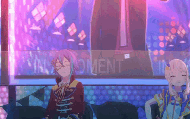 a couple of anime characters sitting in front of a screen that says ' in moment '
