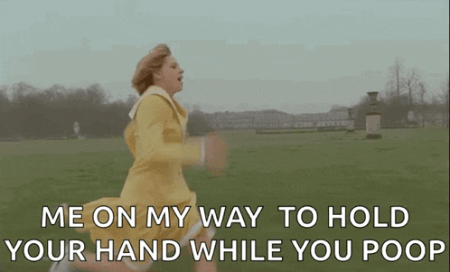 a woman in a yellow dress is running in a field and says `` me on my way to hold your hand while you poop ''