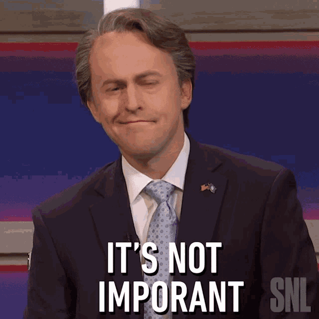 a man in a suit and tie says it 's not important snl