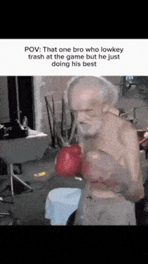an elderly man wearing boxing gloves is doing his best