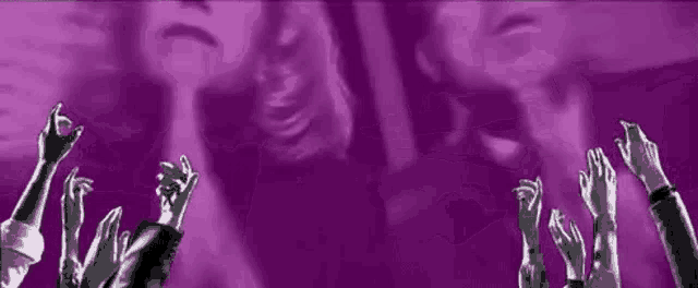 a group of people are raising their hands in the air in a purple background .