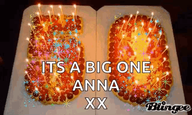 a birthday cake with candles in the shape of the number 50